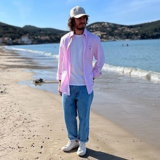 White Baseball Cap Outfits For Men: A pink long sleeve shirt and a white baseball cap are essential in any guy's great casual sartorial collection. Kick up the fashion factor of this getup by rounding off with a pair of white canvas low top sneakers.