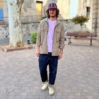 Light Violet Crew-neck T-shirt Outfits For Men: Consider pairing a light violet crew-neck t-shirt with navy jeans to pull together an everyday ensemble that's full of charm and character. To give this look a sleeker twist, complement your ensemble with beige suede desert boots.