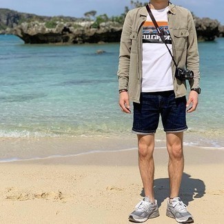 Tan Long Sleeve Shirt Outfits For Men: Pair a tan long sleeve shirt with navy denim shorts to pull together an interesting and modern-looking relaxed casual ensemble. Bring a more casual vibe to by sporting grey athletic shoes.