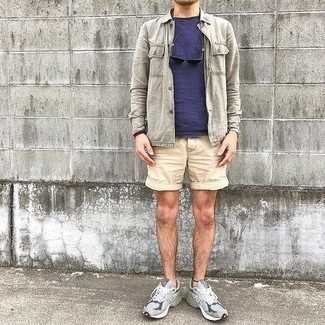 Beige Shorts Outfits For Men: A grey long sleeve shirt and beige shorts are the kind of a never-failing casual combo that you so awfully need when you have no time to spare. To bring out a more laid-back side of you, complete this getup with grey athletic shoes.