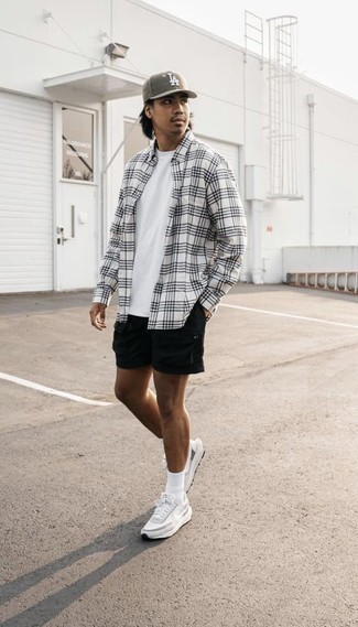White and Brown Athletic Shoes Outfits For Men: To create a casual menswear style with a modern twist, team a white and black plaid long sleeve shirt with black shorts. Want to go easy when it comes to shoes? Add white and brown athletic shoes to the mix for the day.