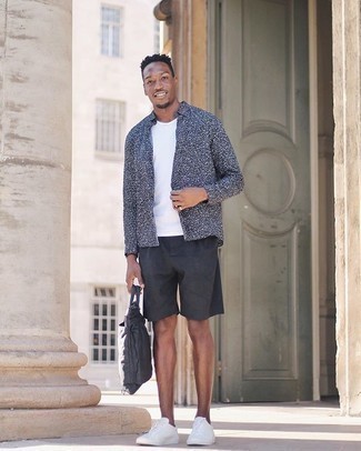 Charcoal Wool Long Sleeve Shirt Outfits For Men: Effortlessly blurring the line between cool and casual, this combination of a charcoal wool long sleeve shirt and black shorts will easily become your go-to. The whole outfit comes together perfectly when you introduce white canvas low top sneakers to the equation.