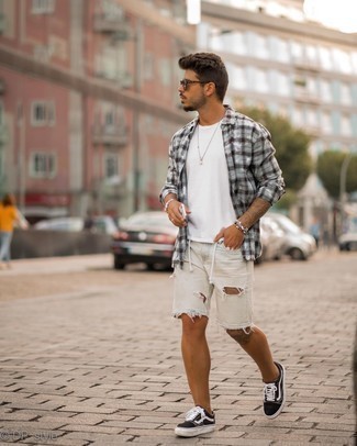White Ripped Denim Shorts Outfits For Men: A grey plaid flannel long sleeve shirt and white ripped denim shorts are great menswear items to have in your casual box. For a classier aesthetic, complement this look with black and white canvas low top sneakers.