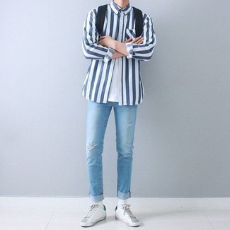 Men's White and Navy Vertical Striped Long Sleeve Shirt, White Crew-neck T-shirt, Light Blue Ripped Skinny Jeans, White Leather Low Top Sneakers