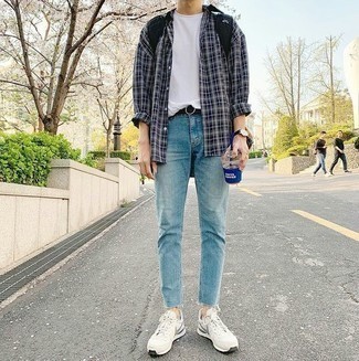 Navy Canvas Backpack Outfits For Men: For a look that's super easy but can be flaunted in a variety of different ways, make a navy and white plaid long sleeve shirt and a navy canvas backpack your outfit choice. Throw in white athletic shoes to easily boost the style factor of any outfit.