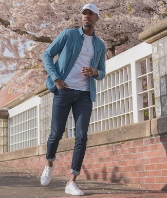 Men's Blue Chambray Long Sleeve Shirt, White Crew-neck T-shirt, Navy Skinny Jeans, White Leather Low Top Sneakers