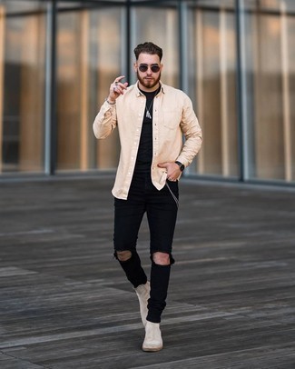 Tan Suede Chelsea Boots Outfits For Men: Nail the cool and casual getup in a beige long sleeve shirt and black ripped skinny jeans. Go off the beaten path and switch up your look by finishing with a pair of tan suede chelsea boots.