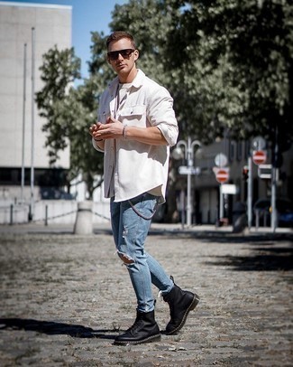 Black Leather Casual Boots Outfits For Men: A white corduroy long sleeve shirt and blue ripped skinny jeans are a savvy combo that will effortlessly take you throughout the day. Make a bit more effort now and complement your getup with black leather casual boots.