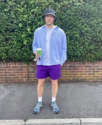 Blue Athletic Shoes Outfits For Men: Infuse a relaxed touch into your daily routine with a light blue vertical striped long sleeve shirt and violet sports shorts. When it comes to footwear, this look is completed well with blue athletic shoes.