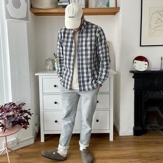 Grey Sweatpants Outfits For Men: This off-duty pairing of a white and black plaid long sleeve shirt and grey sweatpants is simple, seriously stylish and very easy to imitate. Complete your outfit with a pair of charcoal canvas loafers to make the outfit slightly sleeker.