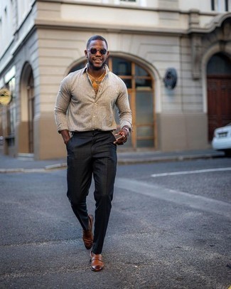 Black Pants with Brown Shoes Dressy Outfits For Men: A grey chambray long sleeve shirt and black pants are among the unshakeable foundations of a versatile wardrobe. Bring an element of elegance to this outfit by slipping into a pair of brown leather loafers.