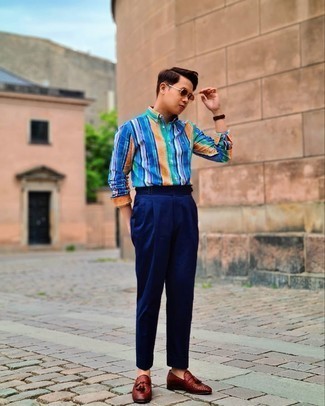 Men's Multi colored Vertical Striped Long Sleeve Shirt, Navy Dress Pants, Burgundy Woven Leather Tassel Loafers, Brown Sunglasses