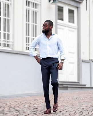Blue Dress Pants Outfits For Men: This is irrefutable proof that a white long sleeve shirt and blue dress pants look amazing if you pair them together in a polished look for today's guy. Our favorite of a great number of ways to finish off this outfit is with a pair of brown leather tassel loafers.