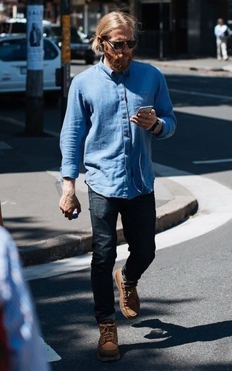 Tan Leather Casual Boots Outfits For Men: This pairing of a light blue long sleeve shirt and navy jeans is super easy to do and so comfortable to sport over the course of the day as well! For a trendy hi/low mix, add tan leather casual boots to the mix.
