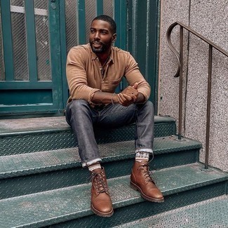 Tan Long Sleeve Shirt Outfits For Men: This pairing of a tan long sleeve shirt and charcoal jeans is effortless, stylish and super easy to recreate. A pair of brown leather casual boots will put a more elegant spin on an otherwise mostly dressed-down look.