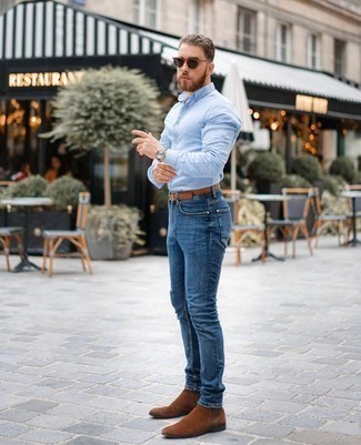 Brown Belt Outfits For Men: For a city casual look without the need to sacrifice on practicality, we like this combination of a light blue long sleeve shirt and a brown belt. You could perhaps get a little creative in the footwear department and complement your outfit with a pair of brown suede chelsea boots.