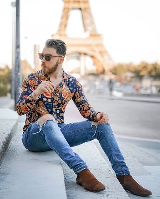Tobacco Suede Chelsea Boots Outfits For Men: A navy print long sleeve shirt and blue ripped jeans are a savvy combination that will take you throughout the day and into the night. Complete your ensemble with a pair of tobacco suede chelsea boots for an air of elegance.