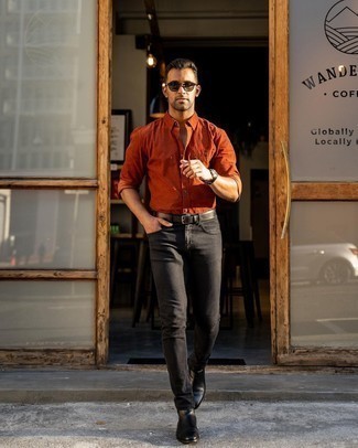 Orange Long Sleeve Shirt Outfits For Men: To create a relaxed outfit with a fashionable spin, consider teaming an orange long sleeve shirt with black jeans. Give a touch of sophistication to your look by finishing with black leather chelsea boots.