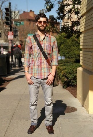 Dark Green Canvas Messenger Bag Outfits: Rock a multi colored plaid long sleeve shirt with a dark green canvas messenger bag for comfort dressing with an edgy spin. Let your outfit coordination savvy really shine by completing this look with a pair of brown leather loafers.