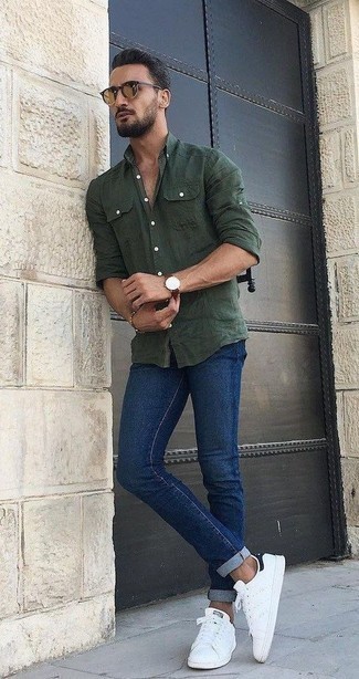Dark Green Long Sleeve Shirt Outfits For Men: For an ensemble that provides functionality and style, consider teaming a dark green long sleeve shirt with navy jeans. If you're clueless about how to finish off, add white leather low top sneakers to your look.