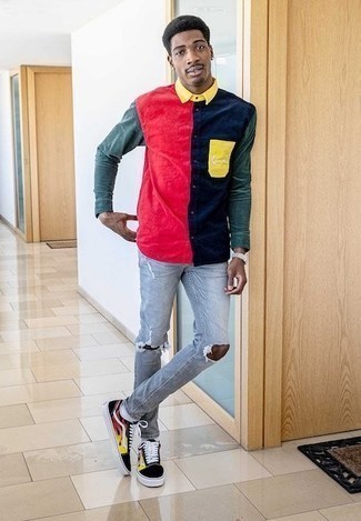 Multi colored Long Sleeve Shirt Outfits For Men: If you appreciate comfort above all else, consider wearing a multi colored long sleeve shirt and light blue ripped jeans. A pair of black print canvas low top sneakers immediately levels up any look.