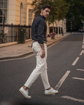 Charcoal Long Sleeve Shirt Outfits For Men: This combo of a charcoal long sleeve shirt and white jeans embodies laid-back cool and comfortable menswear style. Consider a pair of white leather low top sneakers as the glue that pulls your look together.