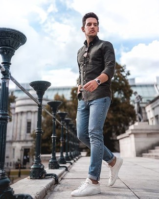 Charcoal Long Sleeve Shirt Outfits For Men: The pairing of a charcoal long sleeve shirt and light blue jeans makes this a killer off-duty outfit. Let your sartorial credentials really shine by finishing off your outfit with white canvas low top sneakers.