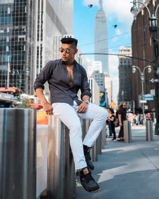 White Jeans Outfits For Men: Consider teaming a navy gingham long sleeve shirt with white jeans for a casual kind of class. A pair of charcoal canvas low top sneakers will be the ideal accompaniment for your ensemble.