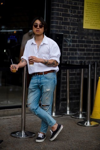 Men's White Long Sleeve Shirt, Blue Ripped Jeans, Navy and White Canvas Low Top Sneakers, Brown Leather Belt