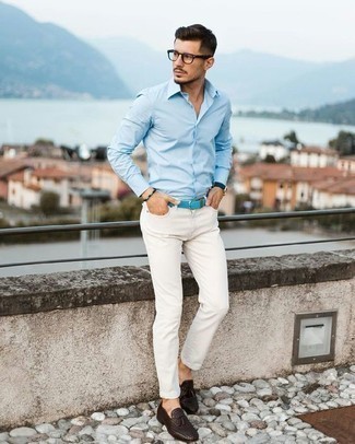 Aquamarine Leather Belt Outfits For Men: Show your laid-back side by opting for a light blue long sleeve shirt and an aquamarine leather belt. If you want to feel a bit fancier now, complete your outfit with a pair of dark brown leather tassel loafers.