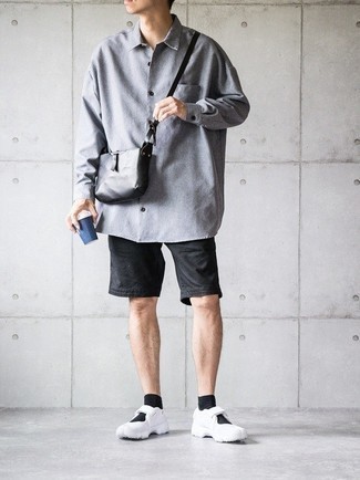 Grey Long Sleeve Shirt Outfits For Men: Inject versatility into your daily casual arsenal with a grey long sleeve shirt and black shorts. For an on-trend on and off-duty mix, add a pair of white athletic shoes to the mix.