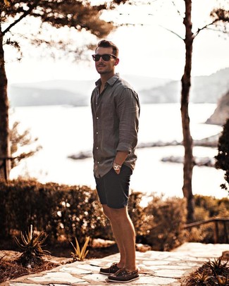 Grey Linen Long Sleeve Shirt Outfits For Men: A grey linen long sleeve shirt and navy shorts will infuse serious style into your current casual routine. A pair of brown leather boat shoes can integrate brilliantly within a ton of ensembles.