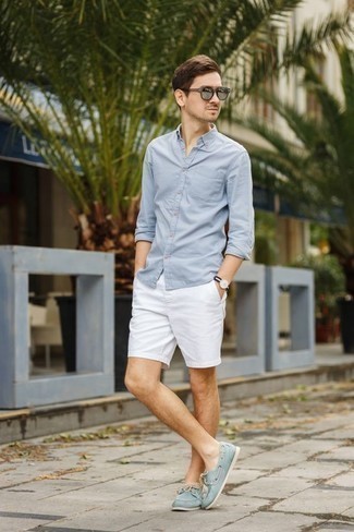 Light Blue Suede Boat Shoes Outfits: You're looking at the hard proof that a light blue long sleeve shirt and white shorts are amazing when teamed together in a relaxed casual ensemble. A pair of light blue suede boat shoes will be the ideal companion for your getup.