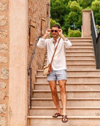 Flip Flops Outfits For Men In Their 30s: A white long sleeve shirt and grey vertical striped shorts? This is easily a wearable ensemble that you could wear a variation of on a day-to-day basis. Complement this ensemble with a pair of flip flops to make a traditional outfit feel suddenly fresh. All in all, a good demonstration of relaxed fashion for 30-year-olds.