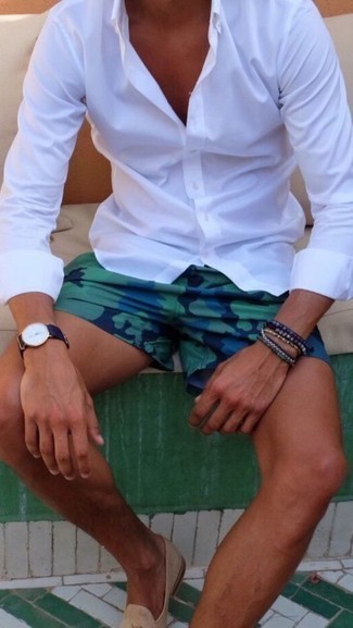 Dark Green Camouflage Shorts Outfits For Men: This casual combination of a white long sleeve shirt and dark green camouflage shorts can only be described as outrageously sharp. Beige suede loafers will give an extra dose of style to an otherwise mostly dressed-down getup.
