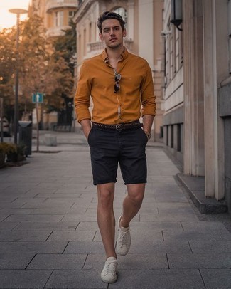 Tobacco Long Sleeve Shirt Outfits For Men: Wear a tobacco long sleeve shirt with navy shorts for a casual kind of class. A pair of white canvas low top sneakers finishes off this look very well.