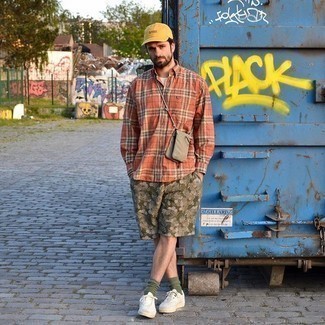 Mustard Baseball Cap Outfits For Men: An orange plaid long sleeve shirt and a mustard baseball cap are a nice combination to add to your casual styling rotation. If you need to instantly polish up this getup with one single piece, why not add white canvas low top sneakers to your look?