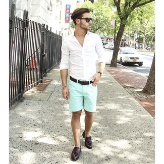 Mint Shorts Outfits For Men: If it's comfort and practicality that you're searching for in an ensemble, reach for a white long sleeve shirt and mint shorts. Complement this look with a pair of burgundy leather tassel loafers to easily up the style factor of your outfit.
