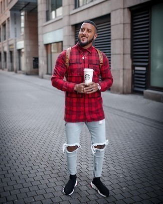 Red and Navy Plaid Long Sleeve Shirt Outfits For Men: This off-duty combination of a red and navy plaid long sleeve shirt and light blue ripped skinny jeans is clean, on-trend and extremely easy to copy. Complete this ensemble with a pair of black and white athletic shoes for extra fashion points.
