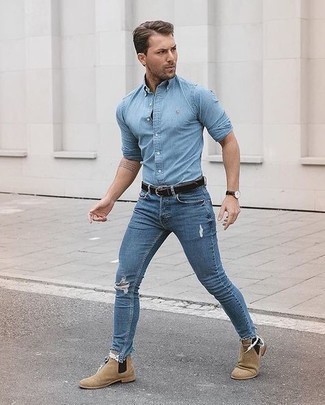 Men's Light Blue Chambray Long Sleeve Shirt, Blue Ripped Skinny Jeans, Tan Suede Chelsea Boots, Black Leather Belt
