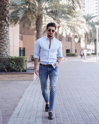 Black Leather Loafers Outfits For Men: This combo of a light blue linen long sleeve shirt and blue ripped skinny jeans makes for the ultimate casual outfit for any modern gentleman. Why not introduce black leather loafers to the equation for an added touch of style?