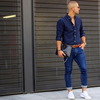 Beige Leather Watch Outfits For Men: A pulled together casual combo of a navy long sleeve shirt and a beige leather watch will set you apart in an instant. If you need to effortlessly class up this ensemble with one single piece, why not introduce white low top sneakers to the equation?
