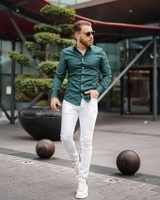 Dark Green Long Sleeve Shirt Outfits For Men: Opt for a dark green long sleeve shirt and white skinny jeans if you want to look neat and relaxed without making too much effort. A pair of white leather low top sneakers is a wonderful choice to finish off your look.