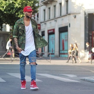 Green Camouflage Long Sleeve Shirt Outfits For Men: A green camouflage long sleeve shirt and blue ripped jeans are a great combination to add to your off-duty styling repertoire. A pair of red high top sneakers is a goofproof footwear option that's also full of character.
