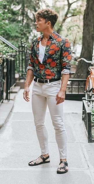 White Tank Outfits For Men: For comfort dressing with a street style finish, try pairing a white tank with white skinny jeans. Change up this look by sporting a pair of black leather sandals.