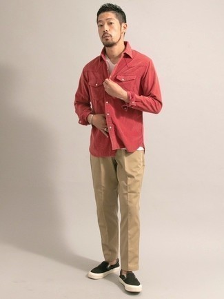 Black Canvas Slip-on Sneakers Outfits For Men: A red long sleeve shirt and khaki chinos are a great combo that will take you throughout the day and into the night. A nice pair of black canvas slip-on sneakers pulls this look together.