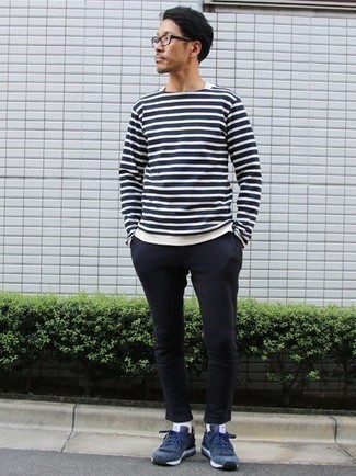 White and Navy Horizontal Striped Long Sleeve T-Shirt Outfits For Men: Go for a white and navy horizontal striped long sleeve t-shirt and navy chinos and you'll be prepared for wherever the day takes you. A pair of navy athletic shoes easily turns up the appeal of your getup.