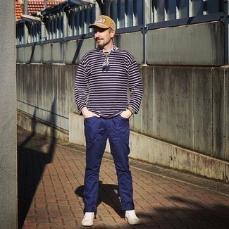 Navy Print Bandana Outfits For Men: Parade your prowess in menswear styling by teaming a navy and white horizontal striped long sleeve t-shirt and a navy print bandana for a city casual ensemble. Rounding off with a pair of white canvas high top sneakers is an effective way to introduce a bit of flair to your look.