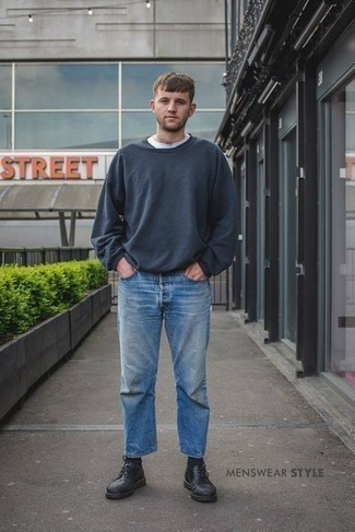 Navy Long Sleeve T-Shirt Outfits For Men: This pairing of a navy long sleeve t-shirt and light blue jeans is hard proof that a straightforward casual outfit doesn't have to be boring. Go off the beaten path and shake up your getup by rocking black leather derby shoes.