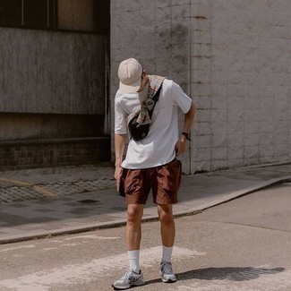 Tobacco Shorts Outfits For Men: For a cool and relaxed getup, rock a grey horizontal striped long sleeve t-shirt with tobacco shorts — these items fit beautifully together. Why not complement this look with a pair of silver athletic shoes for a more casual feel?